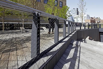 A small path with stainless steel balustrade for path to protect passing pedestrians, especially small kids.