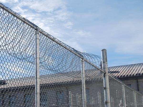 The aluminum coated chain link fencing is installed surround the factory.