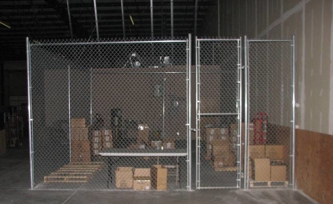 Indoor chain link fence for a warehouse.