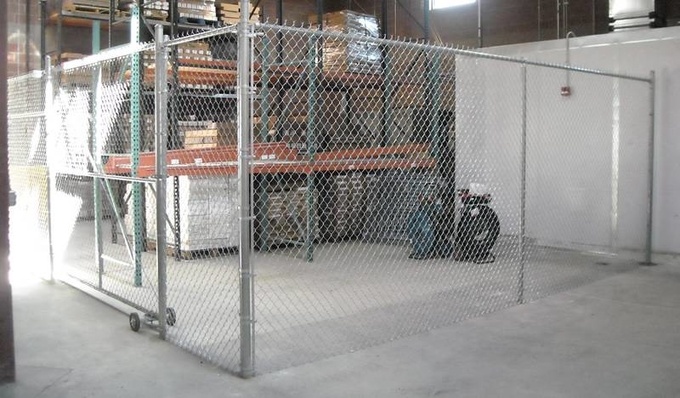 An indoor chain link fence for a temporary enclosure.