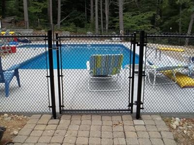 Black vinyl-coating swimming pool chain link fence with swing gate.
